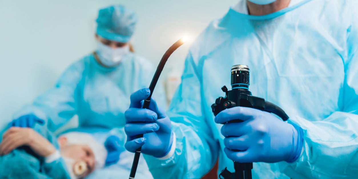 doctor with instruments for colonoscopy